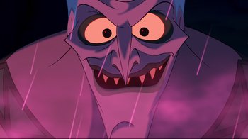 Movie still from “Hercules” (1997), directed by Ron Clements – An evil looking cartoon character with purple eyes and purple hair; Extreme Close Up shot, Low angle