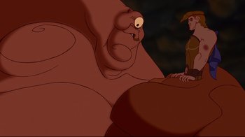 Movie still from “Hercules” (1997), directed by Ron Clements – An animated elephant sitting next to a man; Medium shot, Low angle