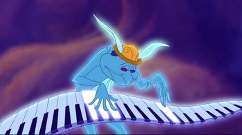 Movie still from “Hercules” (1997), directed by Ron Clements – A blue creature with a hat on playing the piano; Medium shot, High angle