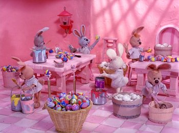 Movie still from “Here Comes Peter Cottontail” (1971), directed by Jules Bass – Many stuffed animals in a pink room; Wide shot, High angle