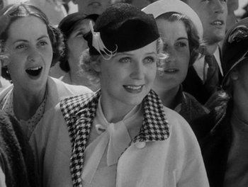 Movie still from “Here Comes the Navy” (1934), directed by Lloyd Bacon – A group of women standing next to each other; Close Up shot, Over the shoulder angle