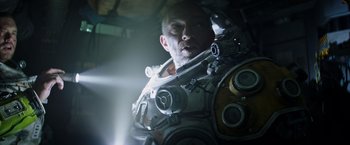 Movie still from “Underwater” (2020), directed by William Eubank – Medium shot, Low angle