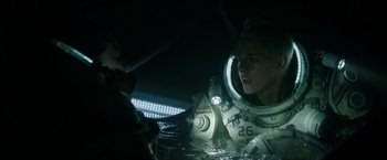 Movie still from “Underwater” (2020), directed by William Eubank – Medium shot, Over the shoulder angle