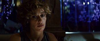 Movie still from “Hereafter” (2010), directed by Clint Eastwood – A person with curly hair; Close Up shot, Over the shoulder angle