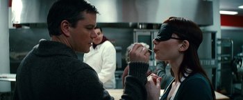 Movie still from “Hereafter” (2010), directed by Clint Eastwood – A man and a woman are eating food together; Close Up shot, Over the shoulder angle