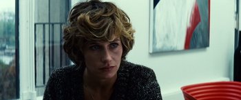 Movie still from “Hereafter” (2010), directed by Clint Eastwood – A person wearing a jacket; Close Up shot, Over the shoulder angle