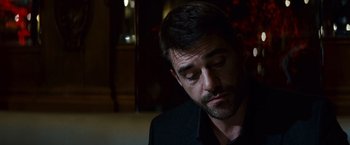 Movie still from “Hereafter” (2010), directed by Clint Eastwood – A person wearing a black shirt; Close Up shot, Over the shoulder angle