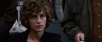 Movie still from “Hereafter” (2010), directed by Clint Eastwood – A person wearing a black shirt; Close Up shot, Over the shoulder angle