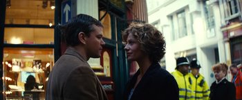 Movie still from “Hereafter” (2010), directed by Clint Eastwood – A man and a woman standing next to each other on the street; Close Up shot, Low angle