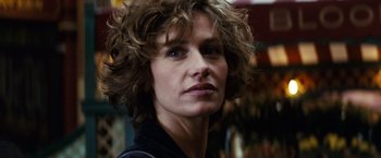 Movie still from “Hereafter” (2010), directed by Clint Eastwood – A person wearing a black shirt; Close Up shot, Low angle