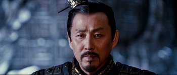 Movie still from “Hero” (2002), directed by Yimou Zhang – A person wearing a hat; Close Up shot, Low angle