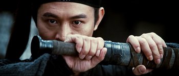 Movie still from “Hero” (2002), directed by Yimou Zhang – A person holding a baseball bat; Close Up shot, Low angle