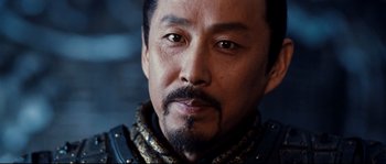 Movie still from “Hero” (2002), directed by Yimou Zhang – A person with a beard; Close Up shot, Over the shoulder angle