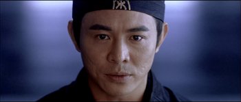 Movie still from “Hero” (2002), directed by Yimou Zhang – A person wearing a hat; Close Up shot, Low angle