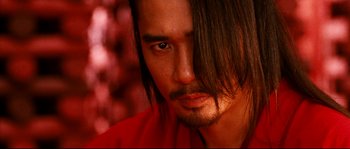 Movie still from “Hero” (2002), directed by Yimou Zhang – A person with long hair; Close Up shot, Low angle