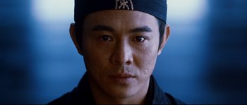Movie still from “Hero” (2002), directed by Yimou Zhang – A person wearing a hat; Close Up shot, Low angle