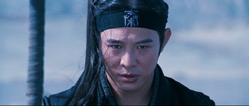 Movie still from “Hero” (2002), directed by Yimou Zhang – A person with long black hair; Close Up shot, Low angle