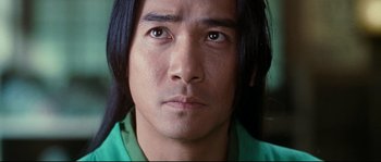 Movie still from “Hero” (2002), directed by Yimou Zhang – A person with long black hair; Close Up shot, Low angle