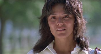 Movie still from “Hickey & Boggs” (1972), directed by Robert Culp – A person wearing a white shirt; Close Up shot, Low angle