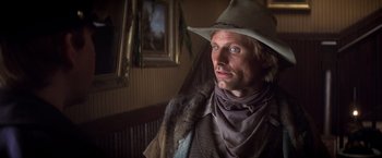 Movie still from “Hidalgo” (2004), directed by Joe Johnston – A man wearing a cowboy hat and a fur coat; Close Up shot, Low angle