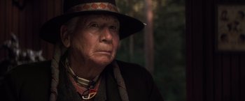 Movie still from “Hidalgo” (2004), directed by Joe Johnston – An older woman wearing a hat and a necklace; Close Up shot, Low angle