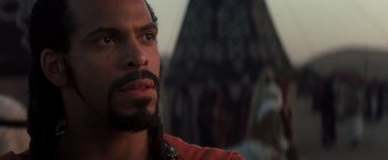 Movie still from “Hidalgo” (2004), directed by Joe Johnston – A person with a beard; Close Up shot, Over the shoulder angle
