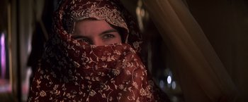 Movie still from “Hidalgo” (2004), directed by Joe Johnston – A woman with a red veil covering her face; Close Up shot, Low angle