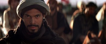 Movie still from “Hidalgo” (2004), directed by Joe Johnston – A person wearing a hat; Close Up shot, Over the shoulder angle
