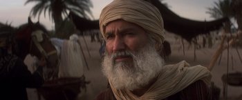Movie still from “Hidalgo” (2004), directed by Joe Johnston – A man with a beard and a turban on; Close Up shot, Low angle
