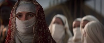 Movie still from “Hidalgo” (2004), directed by Joe Johnston – A woman in a burqa and a man in a burqa; Close Up shot, Over the shoulder angle