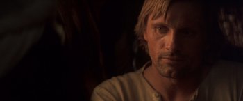 Movie still from “Hidalgo” (2004), directed by Joe Johnston – A person wearing a shirt; Close Up shot, Over the shoulder angle