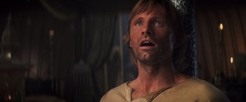 Movie still from “Hidalgo” (2004), directed by Joe Johnston – A person looking up at the sky; Close Up shot, Low angle