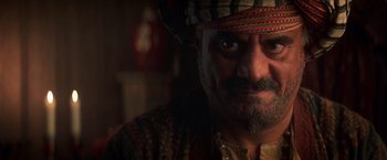 Movie still from “Hidalgo” (2004), directed by Joe Johnston – A person wearing a hat; Close Up shot, Over the shoulder angle