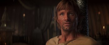 Movie still from “Hidalgo” (2004), directed by Joe Johnston – A person wearing a shirt; Close Up shot, Over the shoulder angle