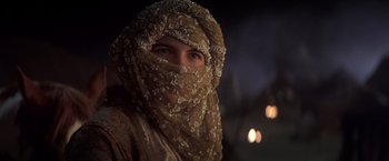 Movie still from “Hidalgo” (2004), directed by Joe Johnston – A person with a veil on their head; Close Up shot, Low angle