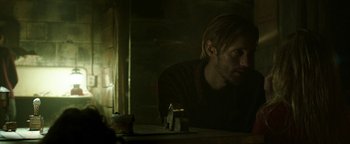 Movie still from “Hidden” (2015), directed by Ross Duffer – A man sitting in front of a bathroom mirror; Close Up shot, Low angle