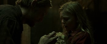 Movie still from “Hidden” (2015), directed by Ross Duffer – A man and a woman are looking at each other; Close Up shot, Over the shoulder angle