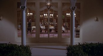 Movie still from “High Anxiety” (1977), directed by Mel Brooks – People are sitting at tables in an elegant restaurant; Wide shot, High angle