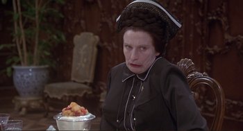 Movie still from “High Anxiety” (1977), directed by Mel Brooks – An old woman sitting in front of a bowl of fruit; Close Up shot, High angle