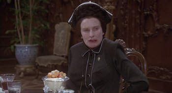 Movie still from “High Anxiety” (1977), directed by Mel Brooks – An older woman sitting at a table with a bowl of fruit; Close Up shot, Over the shoulder angle