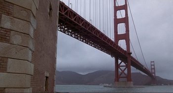 Movie still from “High Anxiety” (1977), directed by Mel Brooks – A view of the golden gate bridge from the water; Extreme Wide shot, Low angle