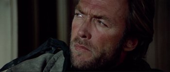 Movie still from “High Plains Drifter” (1973), directed by Clint Eastwood – A person with a beard; Close Up shot, Low angle