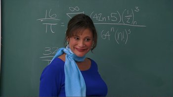 Movie still from “High School Musical” (2006), directed by Kenny Ortega – A woman standing in front of a chalkboard; Close Up shot, Over the shoulder angle