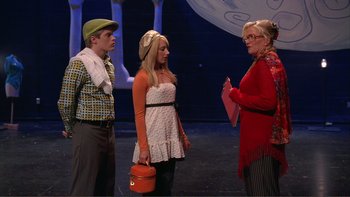 Movie still from “High School Musical” (2006), directed by Kenny Ortega – A group of people standing next to each other on a stage; Medium shot, Low angle