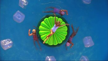 Movie still from “High School Musical 2” (2007), directed by Kenny Ortega – A group of people swimming in a pool with an inflatbale; Extreme Wide shot, Overhead angle