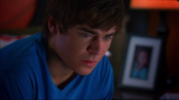 Movie still from “High School Musical 2” (2007), directed by Kenny Ortega – A person with a blue shirt; Close Up shot, Over the shoulder angle