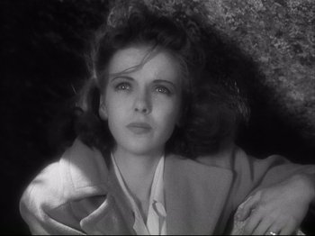 Movie still from “High Sierra” (1940), directed by Raoul Walsh – A black - and - white photo of a young woman; Close Up shot, High angle