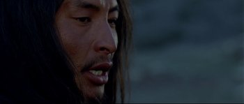 Movie still from “Himalaya” (1999), directed by Eric Valli – A person with long hair; Close Up shot, Low angle
