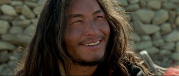 Movie still from “Himalaya” (1999), directed by Eric Valli – A person with long black hair; Close Up shot, Low angle