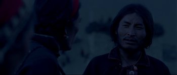 Movie still from “Himalaya” (1999), directed by Eric Valli – A man and a woman talking to each other; Close Up shot, Over the shoulder angle